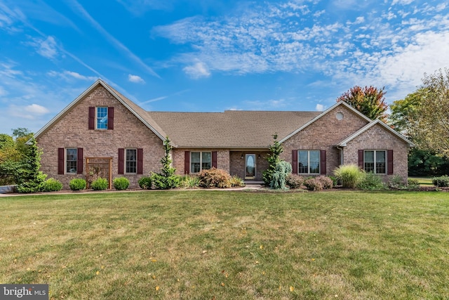 view of front of home with a front lawn