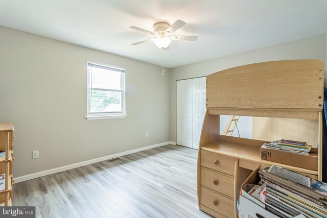 office area featuring light wood-type flooring and ceiling fan