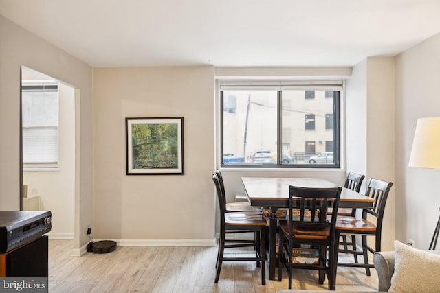 dining area with light wood-type flooring