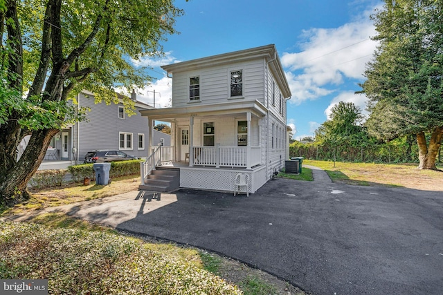 view of front of house featuring central AC and covered porch