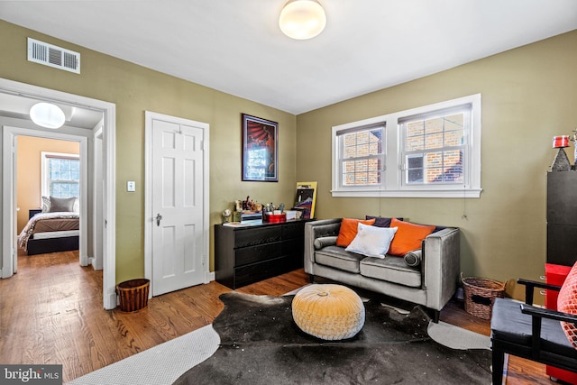 living area featuring hardwood / wood-style flooring