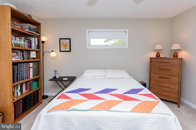 bedroom featuring light colored carpet