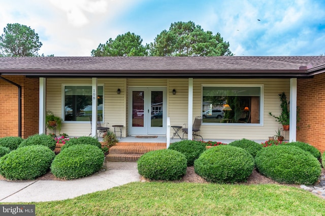 ranch-style home with covered porch