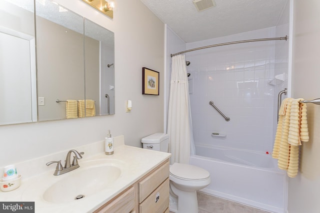 full bathroom with shower / bath combo, a textured ceiling, tile patterned floors, vanity, and toilet