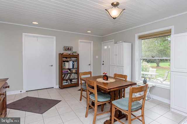 tiled dining area with crown molding