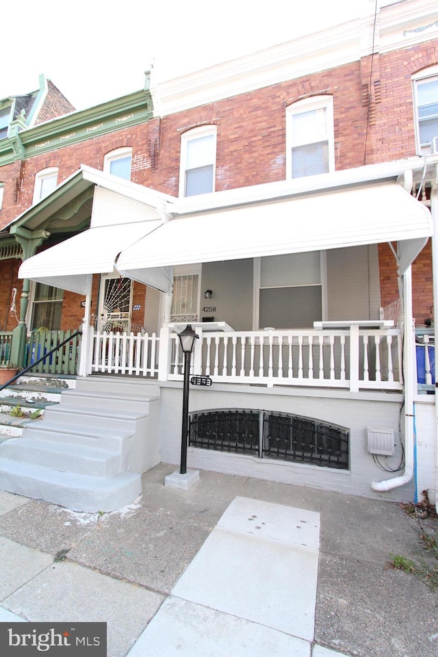 view of front of house with covered porch