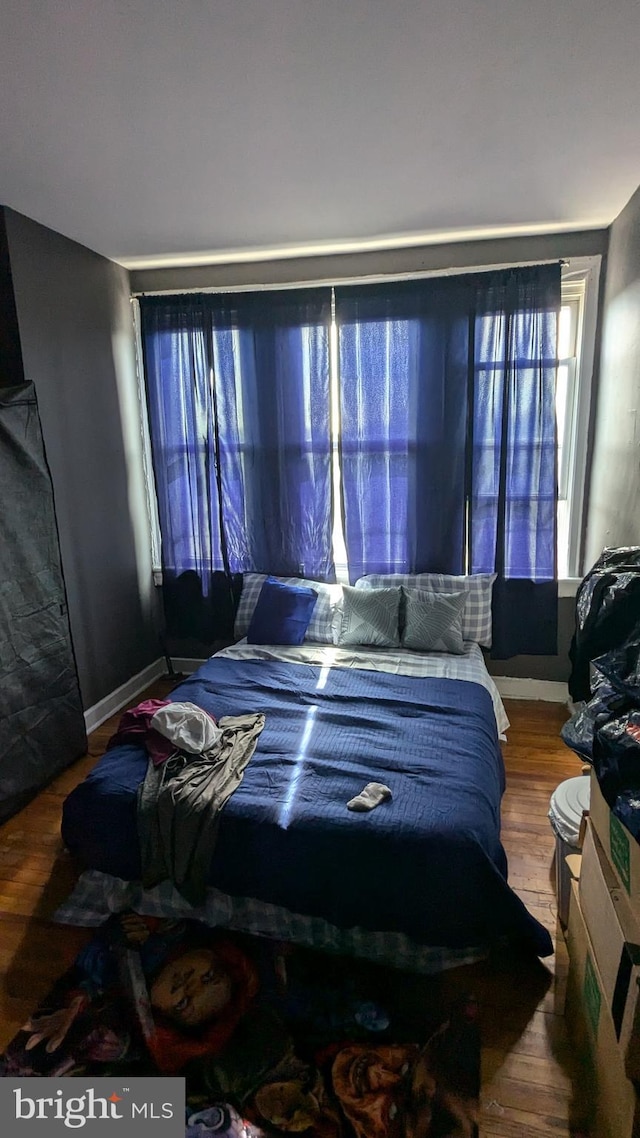 bedroom featuring hardwood / wood-style flooring