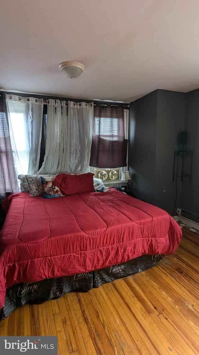 bedroom featuring hardwood / wood-style flooring