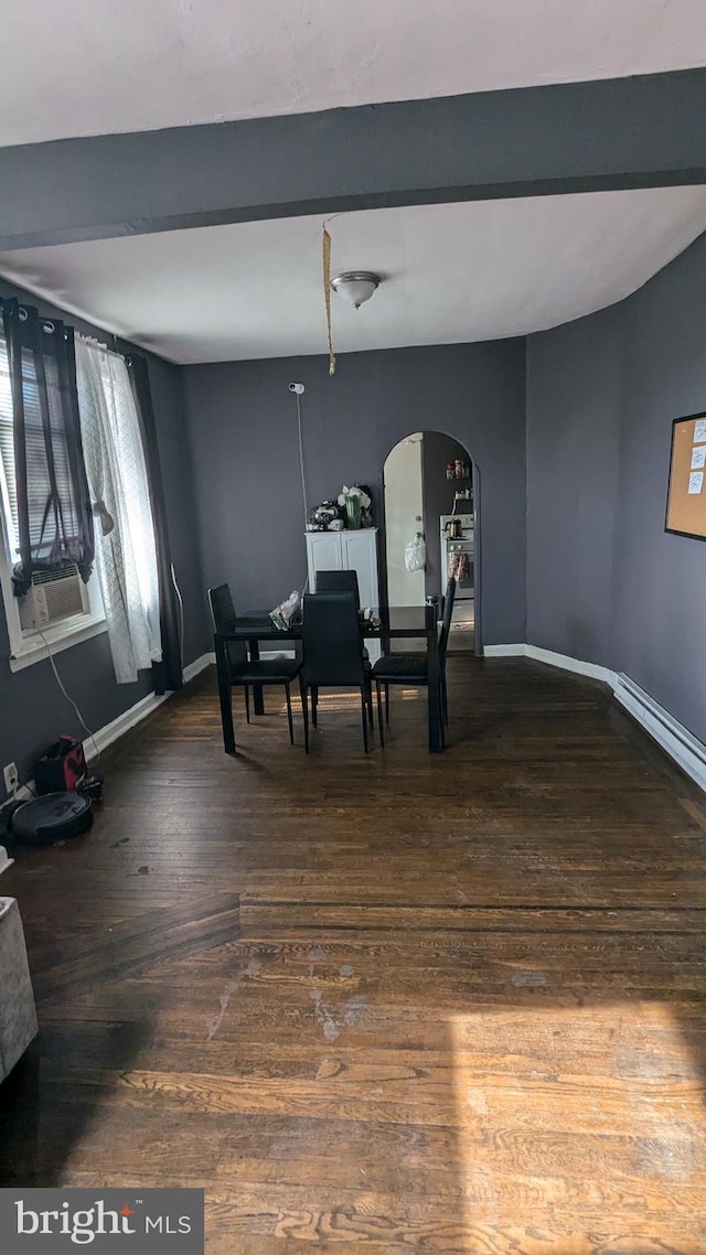 dining room with a baseboard heating unit, wood-type flooring, beamed ceiling, and cooling unit