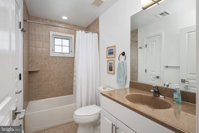 full bathroom featuring shower / tub combo, tile patterned floors, vanity, and toilet