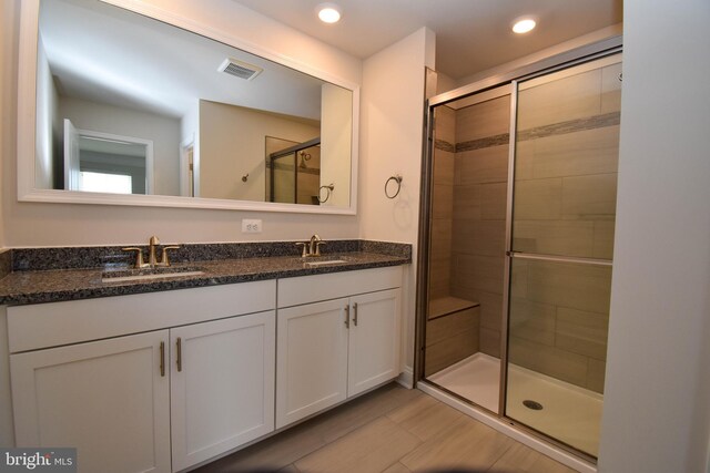 35332 Wright Way, Millsboro, DE 19966 - full bath featuring visible vents, a sink, recessed lighting, and a stall shower