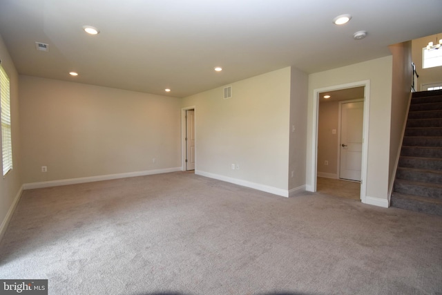 unfurnished room featuring carpet flooring