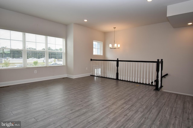 35332 Wright Way, Millsboro, DE 19966 - unfurnished room with baseboards, wood finished floors, and a chandelier