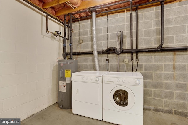 clothes washing area with electric water heater and washing machine and dryer