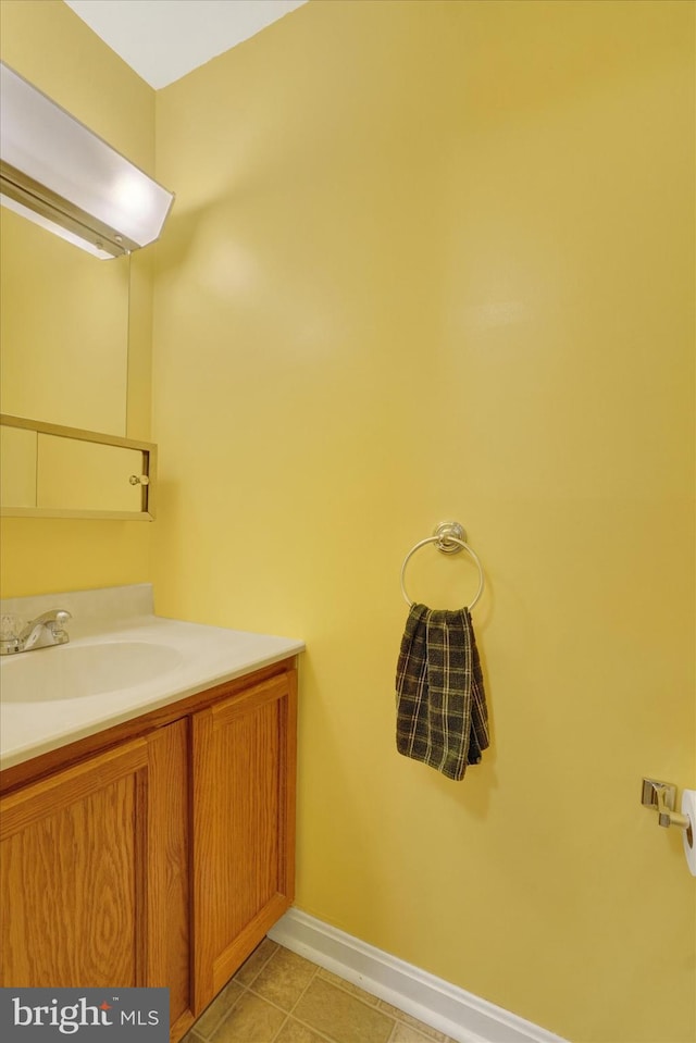 bathroom featuring tile patterned floors and vanity