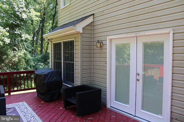 wooden deck with grilling area