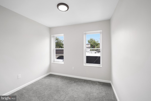 view of carpeted spare room