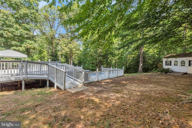 view of yard featuring a deck