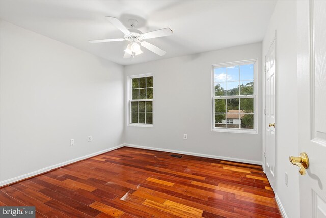 unfurnished room featuring wood-type flooring and ceiling fan