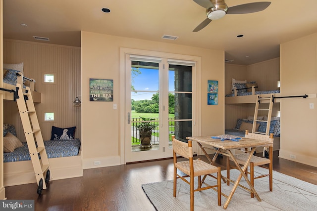 dining space featuring ceiling fan and hardwood / wood-style floors