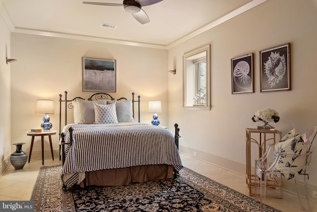 tiled bedroom featuring ceiling fan and crown molding