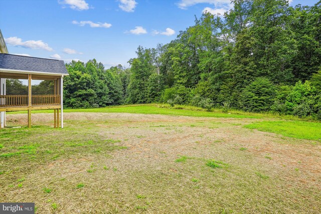 view of yard with a sunroom