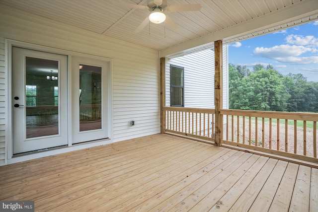 wooden deck featuring ceiling fan