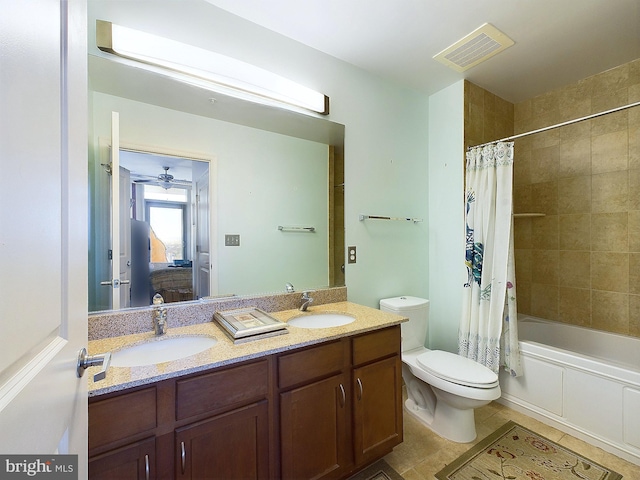 full bathroom with toilet, tile patterned floors, vanity, ceiling fan, and shower / bath combination with curtain