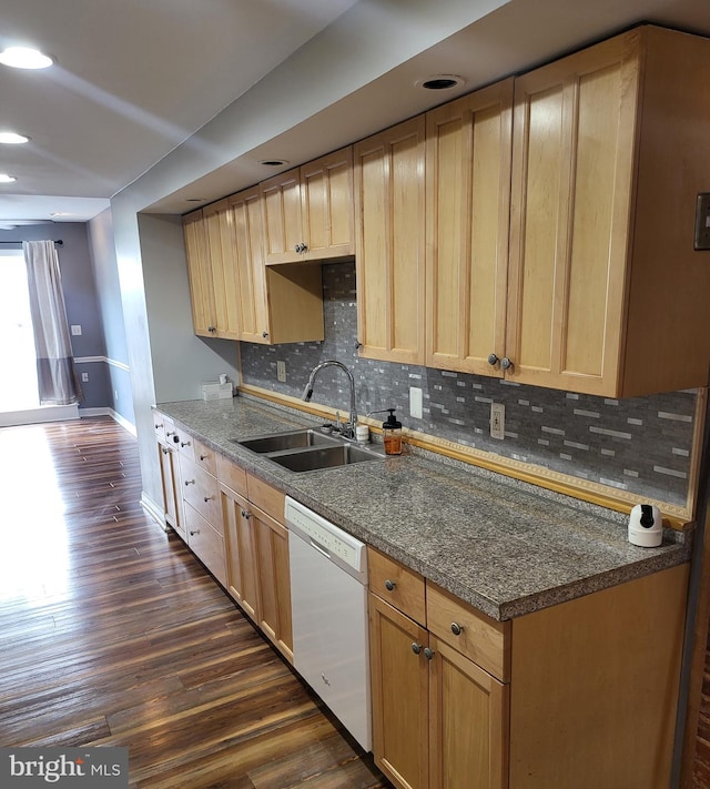 kitchen with backsplash, light brown cabinets, dark hardwood / wood-style flooring, white dishwasher, and sink