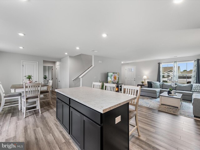 living room with dark hardwood / wood-style flooring