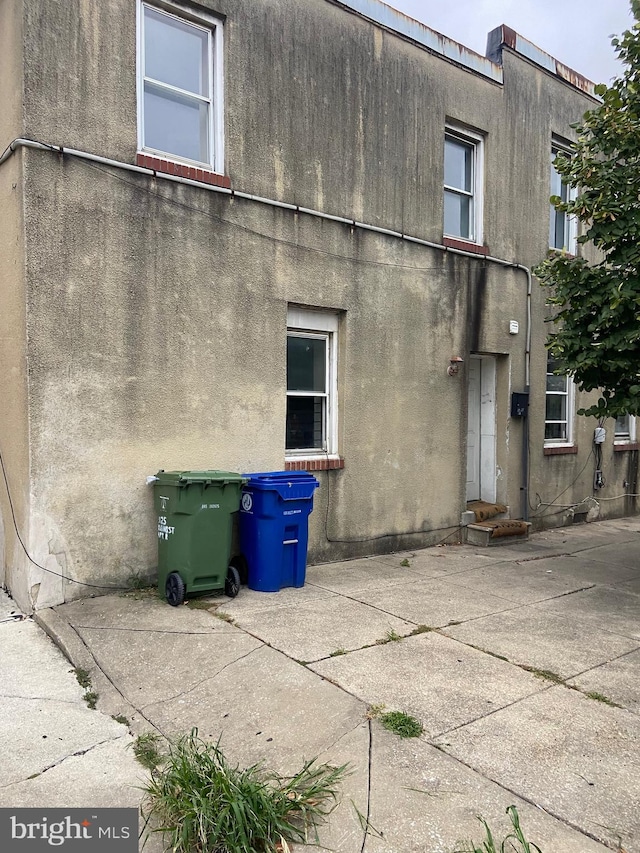 back of house with a patio area