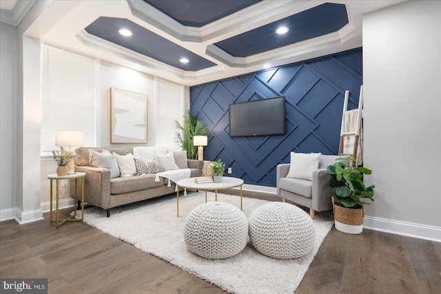 living room with crown molding and dark hardwood / wood-style floors