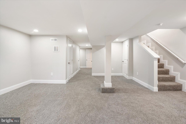 basement with carpet floors