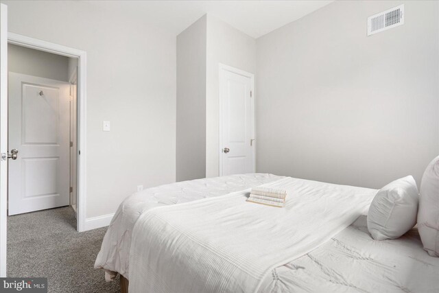 bedroom featuring carpet flooring