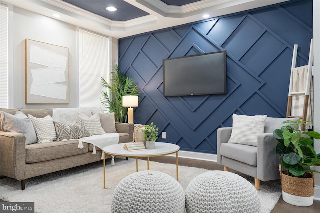 living room with ornamental molding