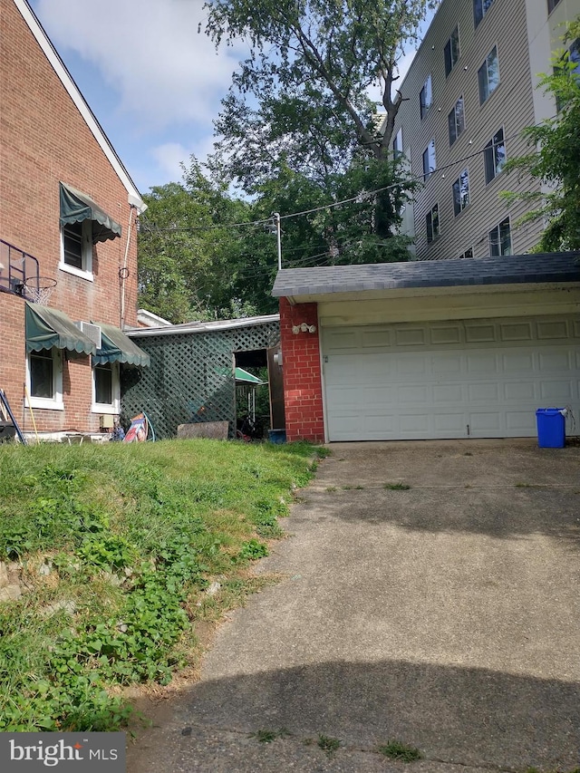 exterior space with a garage