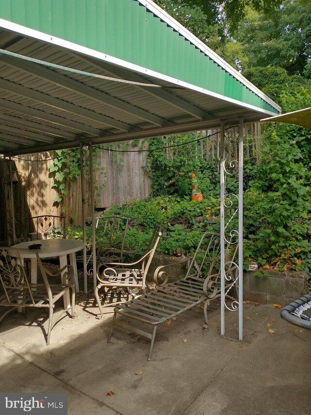 view of patio with a carport