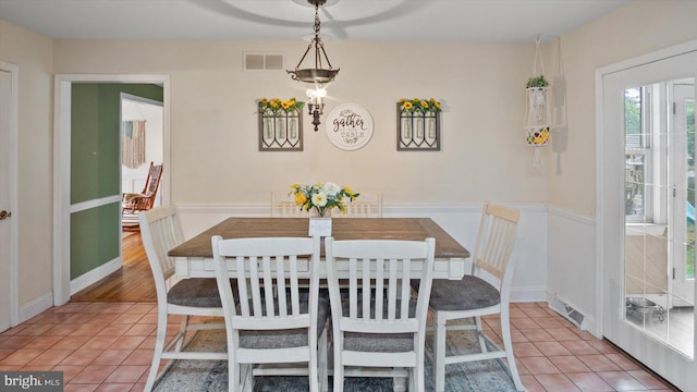 dining room with hardwood / wood-style floors