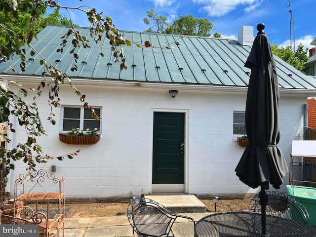 rear view of house with a patio area