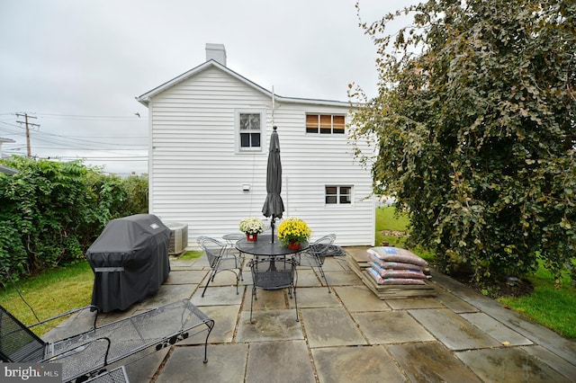 view of patio / terrace with grilling area and central AC unit