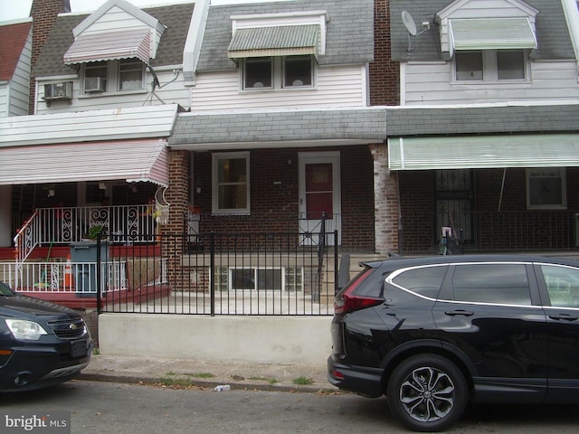 view of front facade featuring covered porch