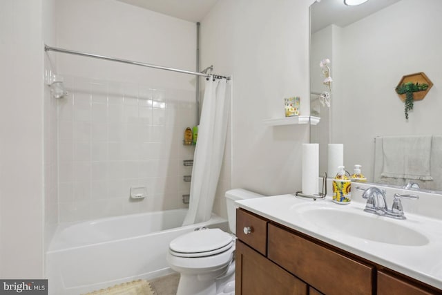 full bathroom featuring shower / bath combination with curtain, vanity, and toilet