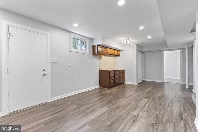 unfurnished living room featuring light hardwood / wood-style flooring