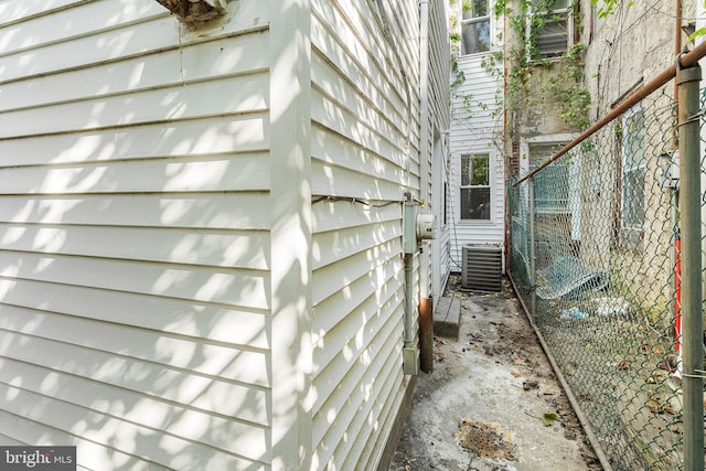 view of side of property featuring cooling unit