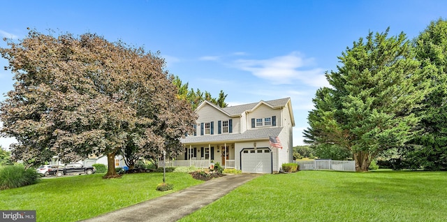 view of front facade featuring a garage and a front lawn