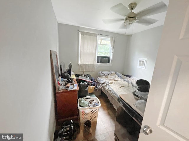 tiled bedroom with cooling unit and ceiling fan