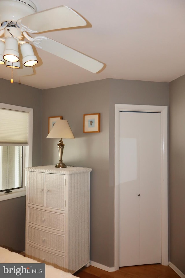 interior space with hardwood / wood-style floors and a closet