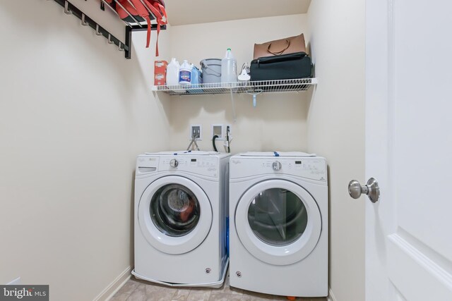 laundry area featuring washing machine and dryer