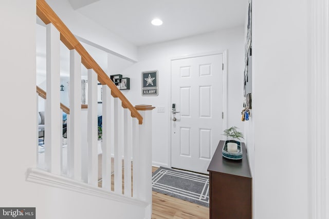 foyer entrance featuring light wood-type flooring