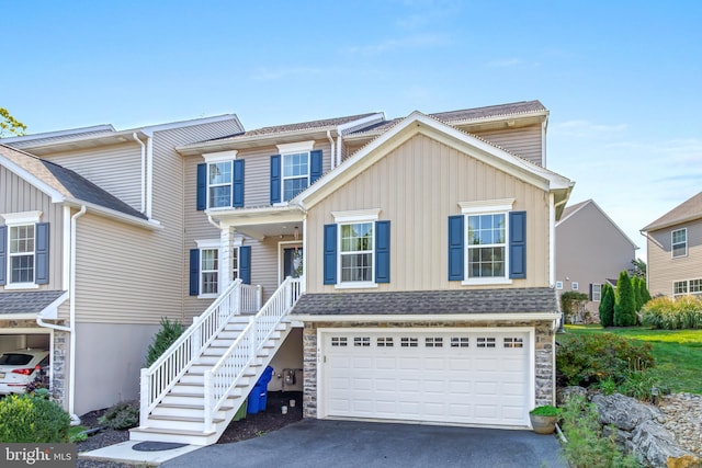 view of front of property with a garage